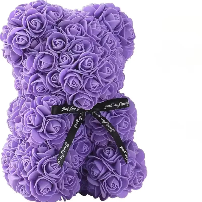 Ursinho roxo de rosas decorativa e laço preto com frase