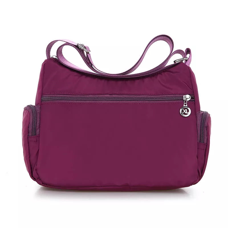 Bolsa Transversal Feminina Impermeável Maitê, Bolsa Transversal Roxa, Bolsa Impermeável, Bolsa Transversal com Muitos Bolsos, Bolsa Feminina a Prova D'água, Bolsa Feminina de Ombro, Bolsa Roxa - lojamillani