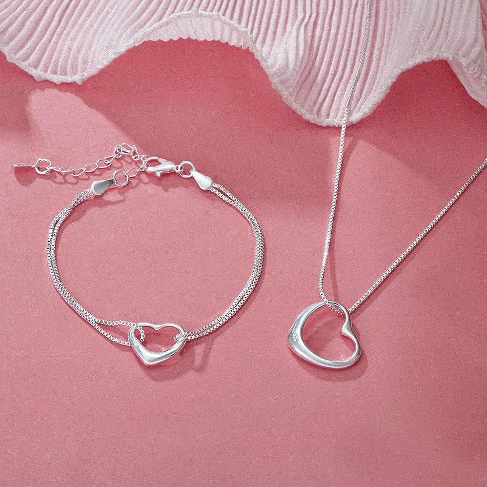 Conjunto Feminino de Prata 925 Rosa Eterna, conjunto prata 925, colar prata 925, pulseira prata 925, conjunto feminino prata 925, acessórios de prata, colar de coração prata 925 - lojamillani