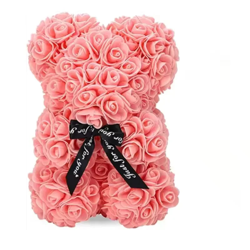 Ursinho de rosas cor rosa com laço preto para presente romântico